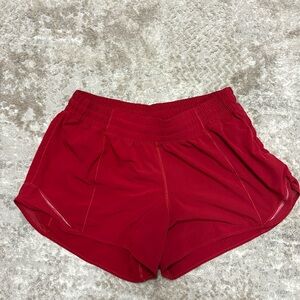 Low rise 4 inch lululemon size ten red shorts